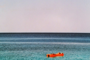 Ikaria adrift - naked in the sun of Seychelles beach
